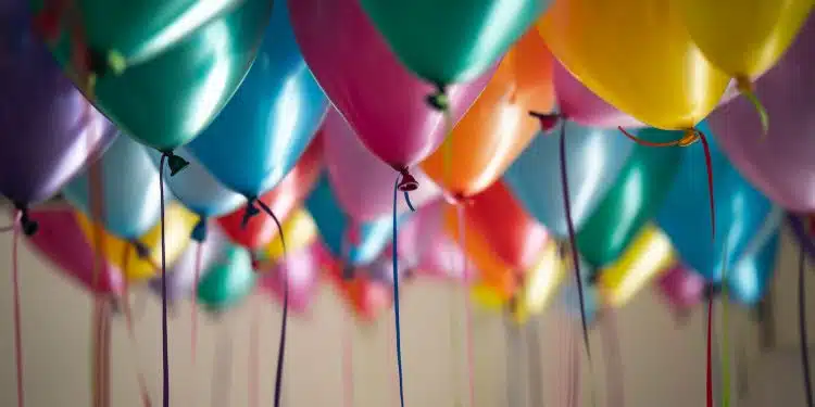 selective focus photography of assorted-color balloons